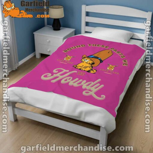 round these parts we love garfiel cowboy pink blanket