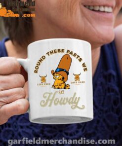 round these parts we love garfiel cowboy white coffee mug