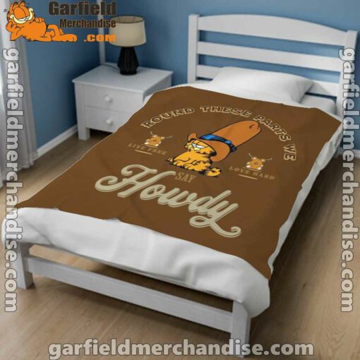 round these parts we love garfiel cowboy brown blanket