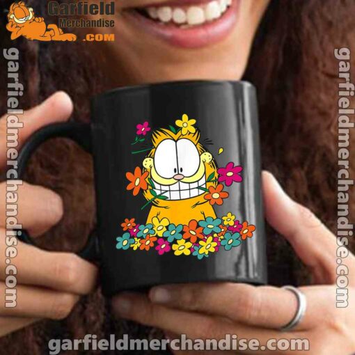 garfield in the garden black mug