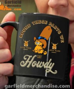 round these parts we love garfiel cowboy black coffee mug