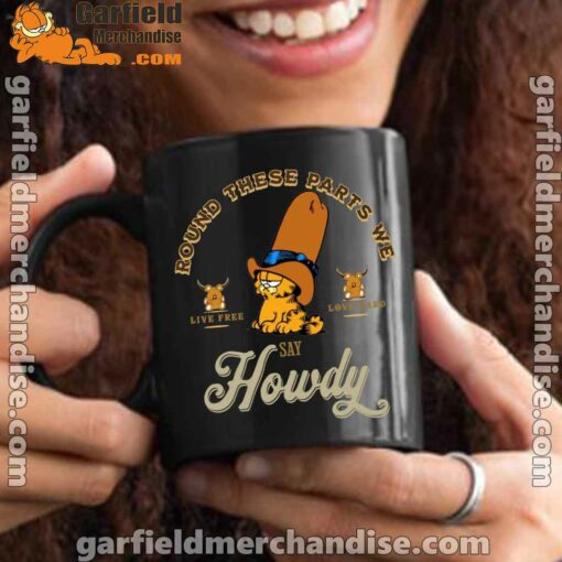 round these parts we love garfiel cowboy black mug