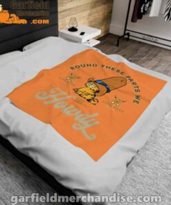 round these parts we love garfiel cowboy orange blanket